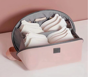 Side view of the Travel Portable Multi-Function Organizer showing the zippered compartments and durable fabric material.