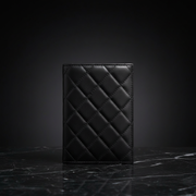 Black quilted passport holder hero