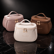 Oval Faux Leather Travel Makeup Bag